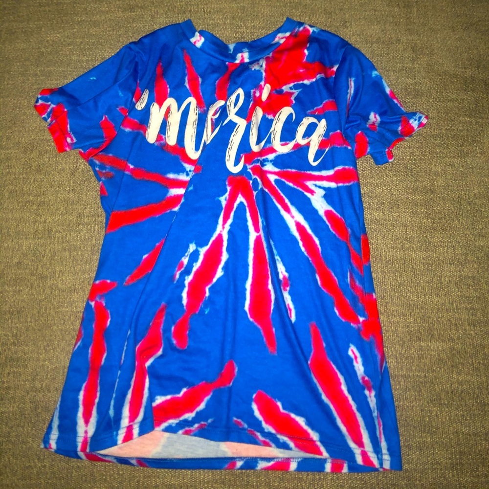 Red white and blue t shirt that says “merica”
